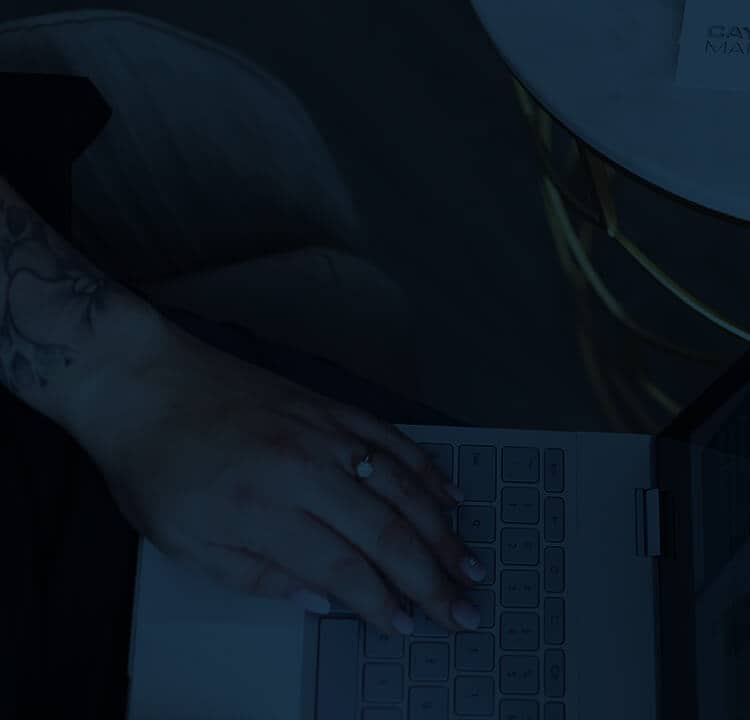 CAYK Team Member working on Website Maintenance