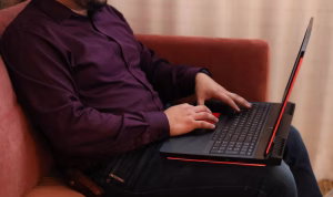 Person using a laptop to research digital marketing channels, illustrating where to advertise a business for better online visibility and customer reach.